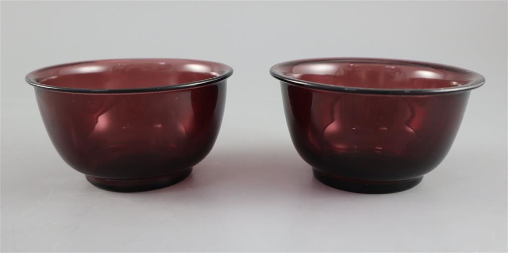 A pair of Chinese Beijing aubergine glass bowls, probably Qing dynasty, 10.5cm diameter